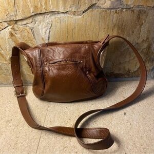 B. Makowsky butter soft brown leather purse with gold coloured hardware